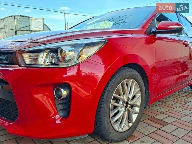 Красный Киа Рио, объемом двигателя 1.4 л и пробегом 24 тыс. км за 12400 $, фото 2 на Automoto.ua