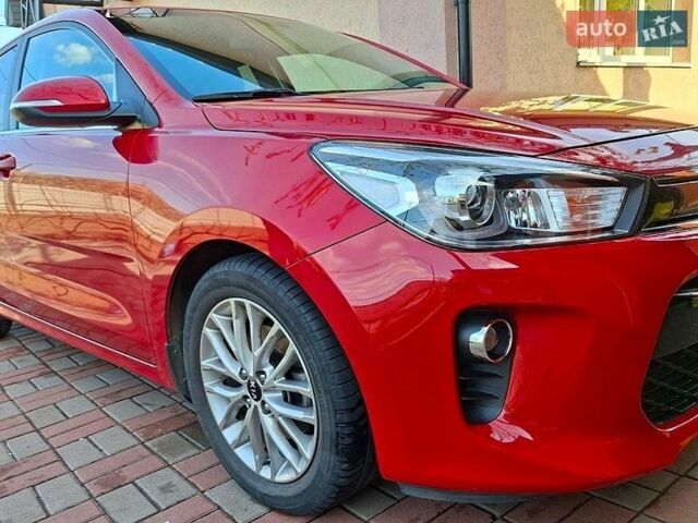 Красный Киа Рио, объемом двигателя 1.4 л и пробегом 24 тыс. км за 12400 $, фото 1 на Automoto.ua
