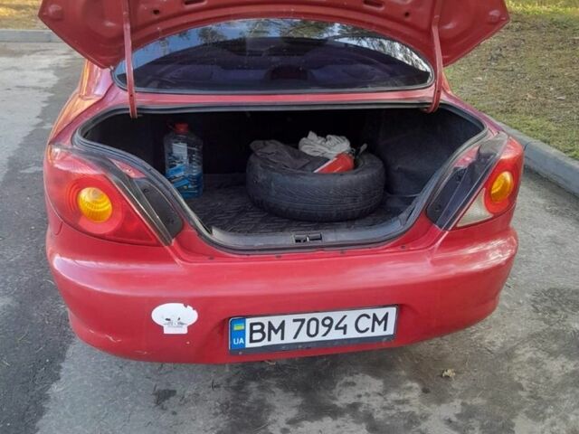 Червоний Кіа Ріо, об'ємом двигуна 1.3 л та пробігом 323 тис. км за 2200 $, фото 7 на Automoto.ua