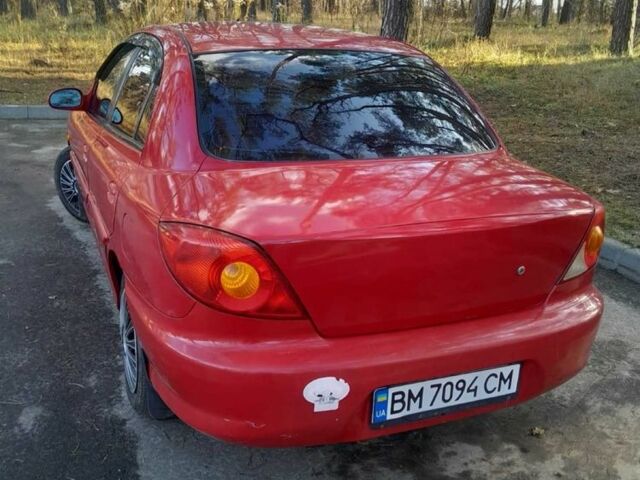 Червоний Кіа Ріо, об'ємом двигуна 1.3 л та пробігом 323 тис. км за 2200 $, фото 3 на Automoto.ua