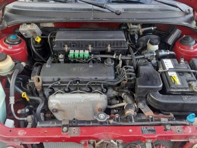 Червоний Кіа Ріо, об'ємом двигуна 1.3 л та пробігом 323 тис. км за 2200 $, фото 6 на Automoto.ua