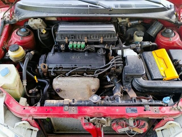Красный Киа Рио, объемом двигателя 1.3 л и пробегом 270 тыс. км за 1799 $, фото 4 на Automoto.ua