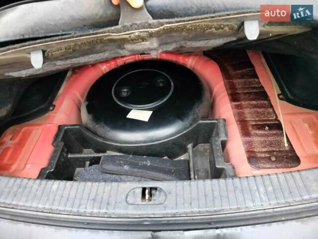 Красный Киа Рио, объемом двигателя 1.34 л и пробегом 243 тыс. км за 4500 $, фото 5 на Automoto.ua