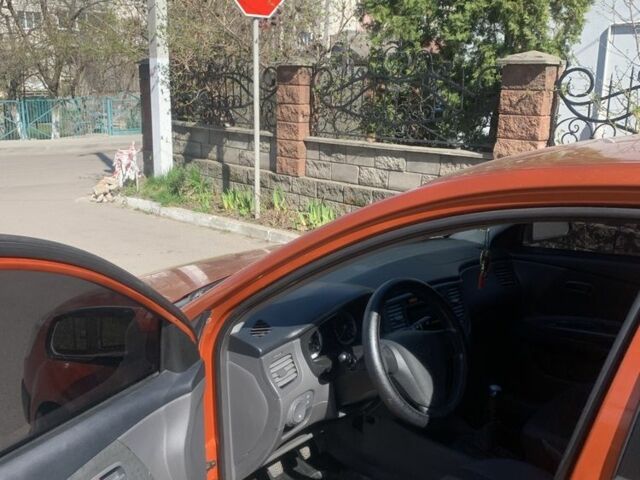 Красный Киа Рио, объемом двигателя 1.5 л и пробегом 377 тыс. км за 3500 $, фото 14 на Automoto.ua