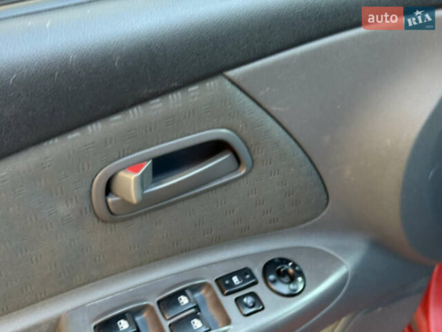 Красный Киа Рио, объемом двигателя 1.4 л и пробегом 272 тыс. км за 3999 $, фото 37 на Automoto.ua