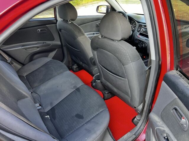 Красный Киа Рио, объемом двигателя 1.4 л и пробегом 255 тыс. км за 2806 $, фото 9 на Automoto.ua
