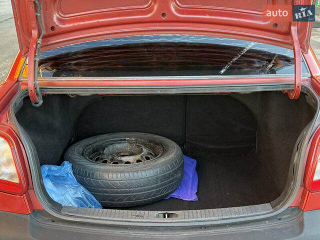 Красный Киа Рио, объемом двигателя 1.4 л и пробегом 272 тыс. км за 3999 $, фото 11 на Automoto.ua