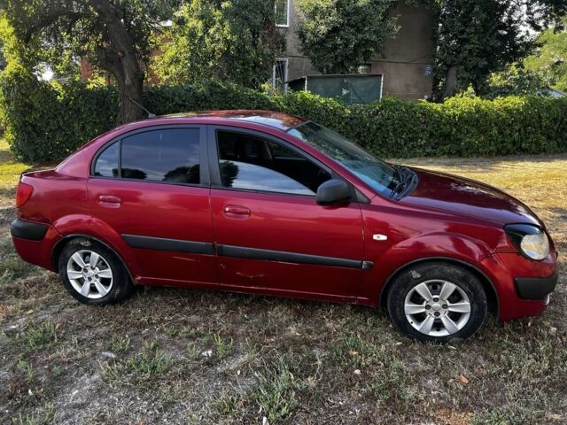 Красный Киа Рио, объемом двигателя 1.4 л и пробегом 255 тыс. км за 2806 $, фото 2 на Automoto.ua