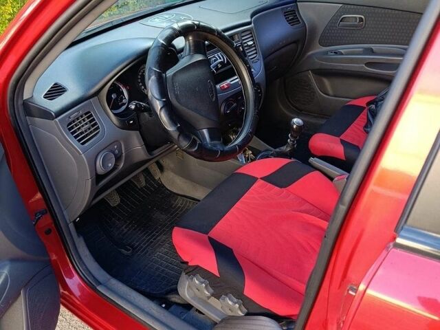 Красный Киа Рио, объемом двигателя 1.4 л и пробегом 97 тыс. км за 7000 $, фото 2 на Automoto.ua