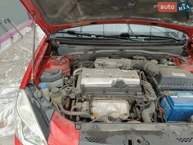 Красный Киа Рио, объемом двигателя 1.3 л и пробегом 230 тыс. км за 4500 $, фото 19 на Automoto.ua