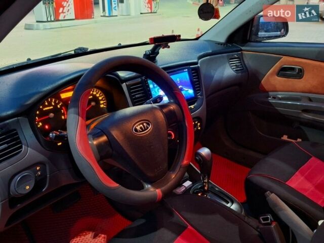 Красный Киа Рио, объемом двигателя 1.4 л и пробегом 185 тыс. км за 5000 $, фото 9 на Automoto.ua
