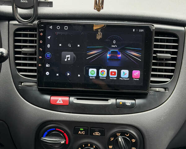 Червоний Кіа Ріо, об'ємом двигуна 1.4 л та пробігом 154 тис. км за 3600 $, фото 13 на Automoto.ua