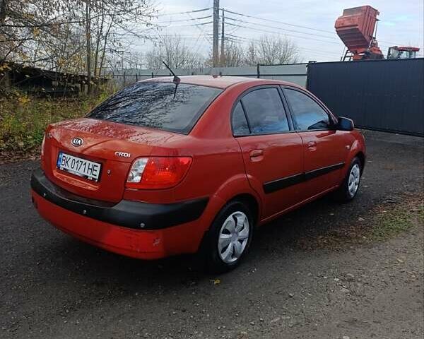 Червоний Кіа Ріо, об'ємом двигуна 1.49 л та пробігом 260 тис. км за 3950 $, фото 5 на Automoto.ua