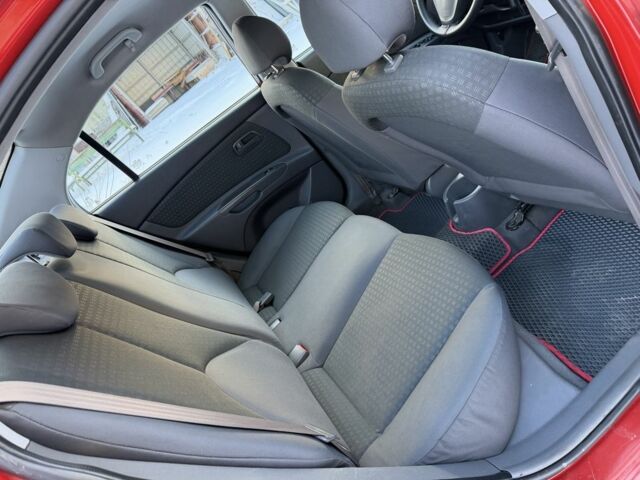 Червоний Кіа Ріо, об'ємом двигуна 1.4 л та пробігом 154 тис. км за 3950 $, фото 10 на Automoto.ua