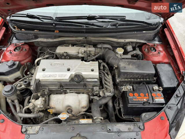 Червоний Кіа Ріо, об'ємом двигуна 1.4 л та пробігом 154 тис. км за 3600 $, фото 15 на Automoto.ua