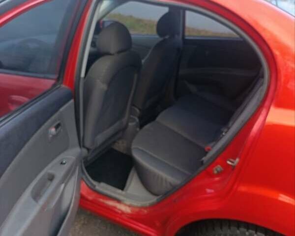 Червоний Кіа Ріо, об'ємом двигуна 1.49 л та пробігом 260 тис. км за 3950 $, фото 2 на Automoto.ua