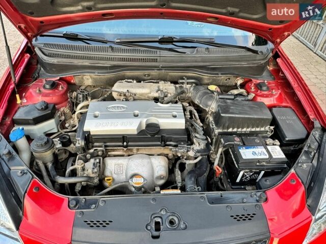 Червоний Кіа Ріо, об'ємом двигуна 1.4 л та пробігом 69 тис. км за 6400 $, фото 8 на Automoto.ua