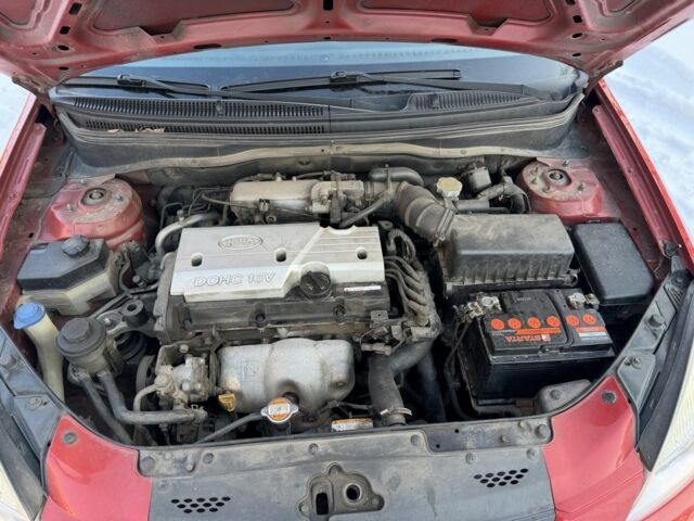 Червоний Кіа Ріо, об'ємом двигуна 1.4 л та пробігом 154 тис. км за 3950 $, фото 13 на Automoto.ua