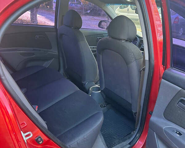 Красный Киа Рио, объемом двигателя 1.4 л и пробегом 215 тыс. км за 4100 $, фото 15 на Automoto.ua