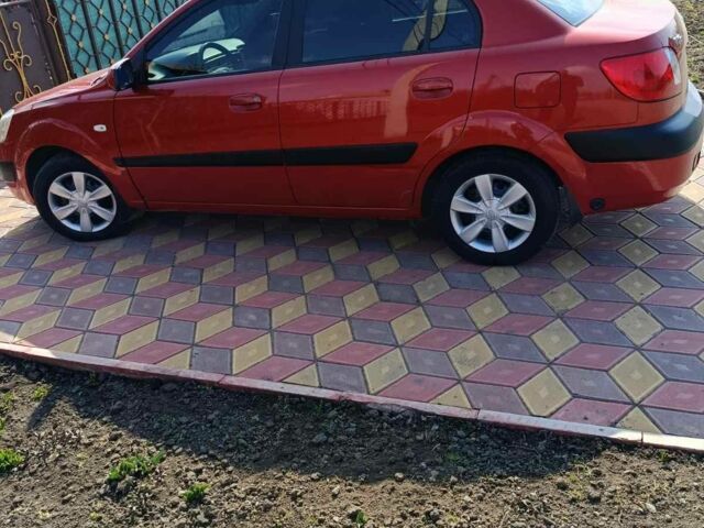 Червоний Кіа Ріо, об'ємом двигуна 1.4 л та пробігом 137 тис. км за 4600 $, фото 13 на Automoto.ua