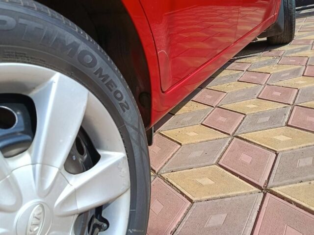 Червоний Кіа Ріо, об'ємом двигуна 1.4 л та пробігом 137 тис. км за 4600 $, фото 12 на Automoto.ua