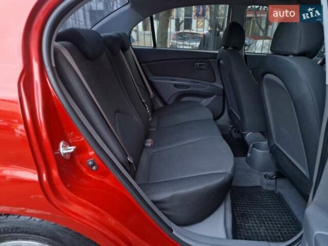 Красный Киа Рио, объемом двигателя 1.4 л и пробегом 100 тыс. км за 6990 $, фото 42 на Automoto.ua