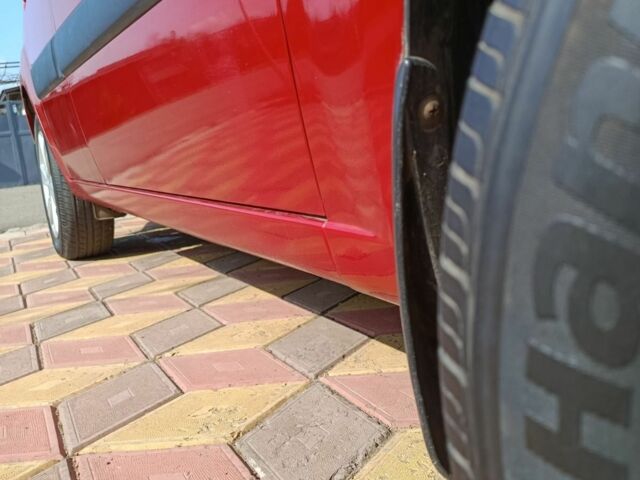 Червоний Кіа Ріо, об'ємом двигуна 1.4 л та пробігом 137 тис. км за 4600 $, фото 23 на Automoto.ua