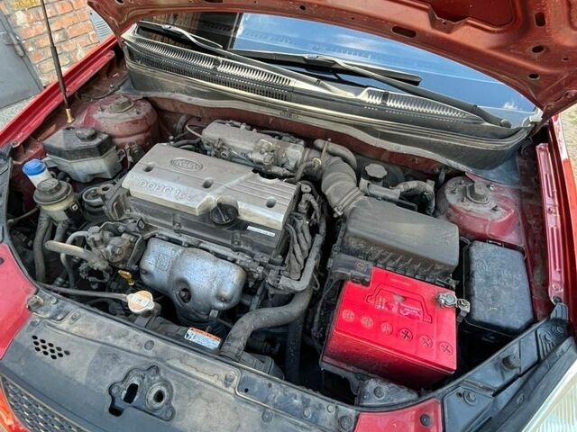 Красный Киа Рио, объемом двигателя 1.4 л и пробегом 119 тыс. км за 5100 $, фото 6 на Automoto.ua