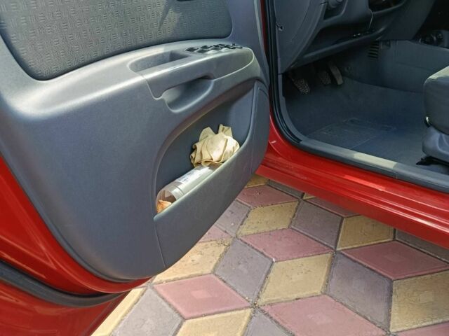 Червоний Кіа Ріо, об'ємом двигуна 1.4 л та пробігом 137 тис. км за 4600 $, фото 20 на Automoto.ua