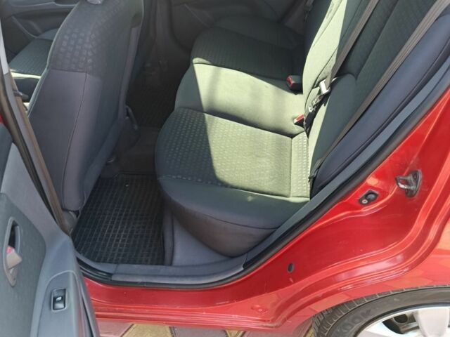 Червоний Кіа Ріо, об'ємом двигуна 1.4 л та пробігом 137 тис. км за 4600 $, фото 9 на Automoto.ua