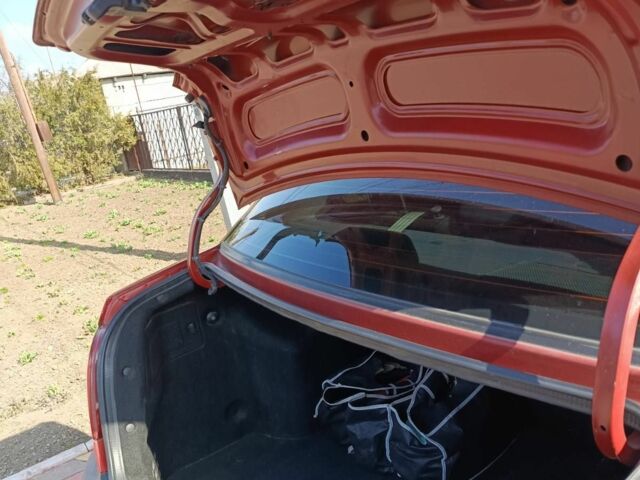 Червоний Кіа Ріо, об'ємом двигуна 1.4 л та пробігом 137 тис. км за 4600 $, фото 22 на Automoto.ua