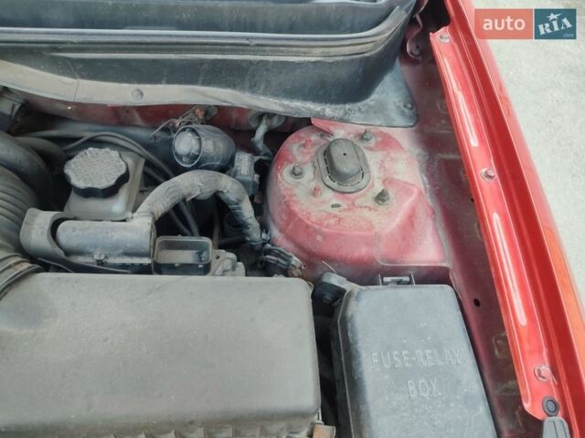 Красный Киа Рио, объемом двигателя 1.4 л и пробегом 185 тыс. км за 4200 $, фото 21 на Automoto.ua