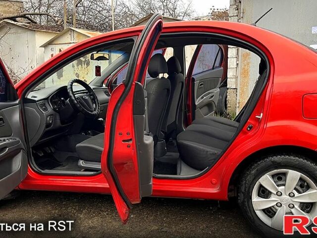 Красный Киа Рио, объемом двигателя 1.5 л и пробегом 198 тыс. км за 3999 $, фото 7 на Automoto.ua
