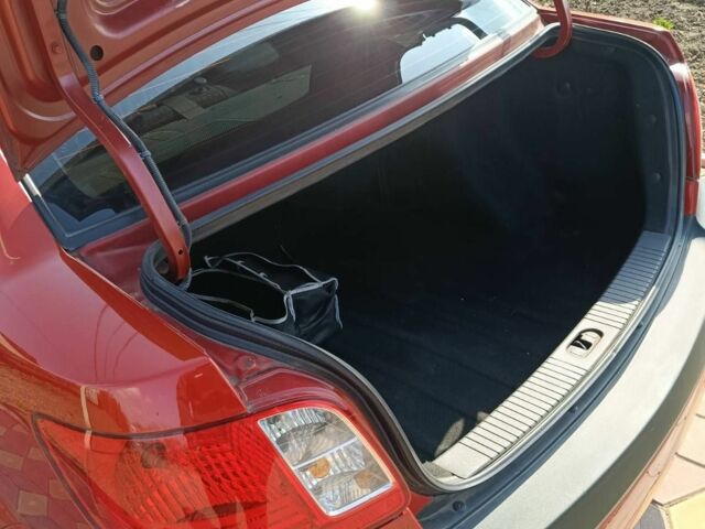 Червоний Кіа Ріо, об'ємом двигуна 1.4 л та пробігом 137 тис. км за 4600 $, фото 16 на Automoto.ua