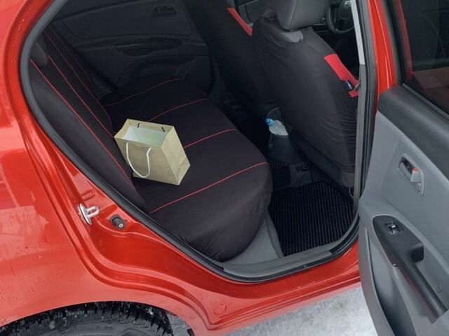 Червоний Кіа Ріо, об'ємом двигуна 1.4 л та пробігом 184 тис. км за 5300 $, фото 14 на Automoto.ua