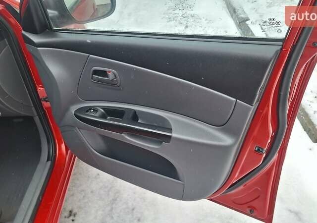 Красный Киа Рио, объемом двигателя 1.4 л и пробегом 180 тыс. км за 4750 $, фото 12 на Automoto.ua