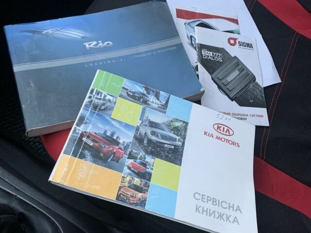 Червоний Кіа Ріо, об'ємом двигуна 1.4 л та пробігом 184 тис. км за 5300 $, фото 13 на Automoto.ua