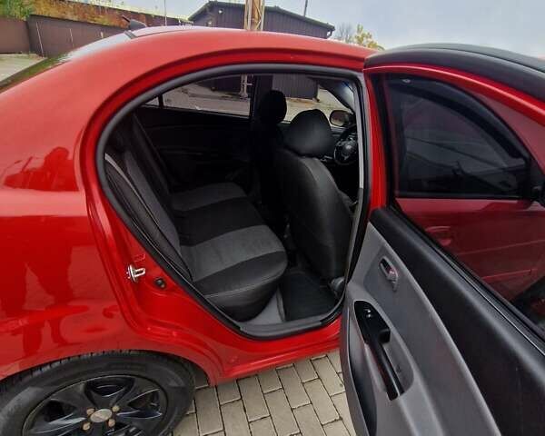 Червоний Кіа Ріо, об'ємом двигуна 1.4 л та пробігом 275 тис. км за 4200 $, фото 3 на Automoto.ua