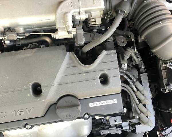 Червоний Кіа Ріо, об'ємом двигуна 1.4 л та пробігом 17 тис. км за 8000 $, фото 10 на Automoto.ua