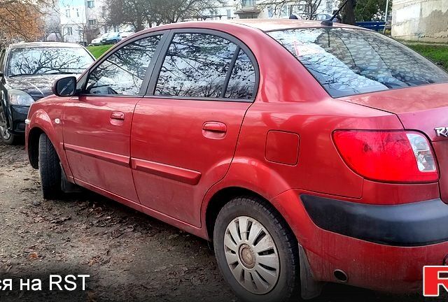 Червоний Кіа Ріо, об'ємом двигуна 1.4 л та пробігом 200 тис. км за 4800 $, фото 1 на Automoto.ua