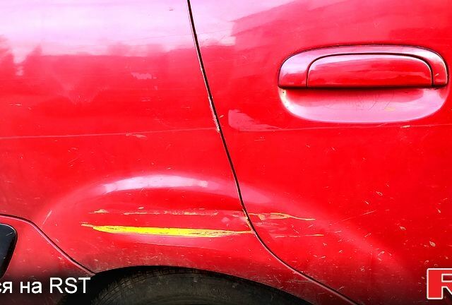 Червоний Кіа Ріо, об'ємом двигуна 1.4 л та пробігом 200 тис. км за 4800 $, фото 9 на Automoto.ua