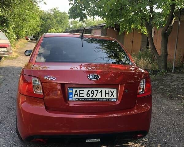 Червоний Кіа Ріо, об'ємом двигуна 1.4 л та пробігом 17 тис. км за 8000 $, фото 3 на Automoto.ua