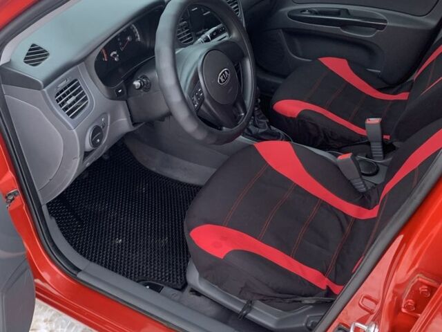 Червоний Кіа Ріо, об'ємом двигуна 1.4 л та пробігом 184 тис. км за 5300 $, фото 11 на Automoto.ua