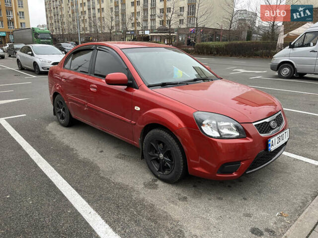 Червоний Кіа Ріо, об'ємом двигуна 1.4 л та пробігом 179 тис. км за 5400 $, фото 1 на Automoto.ua