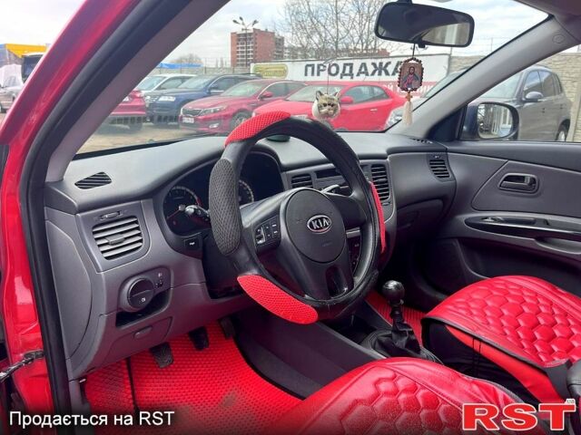 Красный Киа Рио, объемом двигателя 1.4 л и пробегом 113 тыс. км за 5899 $, фото 8 на Automoto.ua