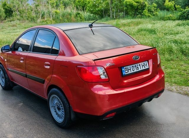 Червоний Кіа Ріо, об'ємом двигуна 1.4 л та пробігом 208 тис. км за 3950 $, фото 17 на Automoto.ua
