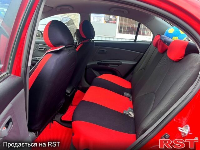 Красный Киа Рио, объемом двигателя 1.4 л и пробегом 113 тыс. км за 5899 $, фото 9 на Automoto.ua