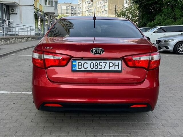 Червоний Кіа Ріо, об'ємом двигуна 1.4 л та пробігом 220 тис. км за 5000 $, фото 5 на Automoto.ua