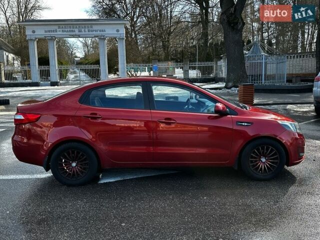 Червоний Кіа Ріо, об'ємом двигуна 1.4 л та пробігом 190 тис. км за 6350 $, фото 3 на Automoto.ua