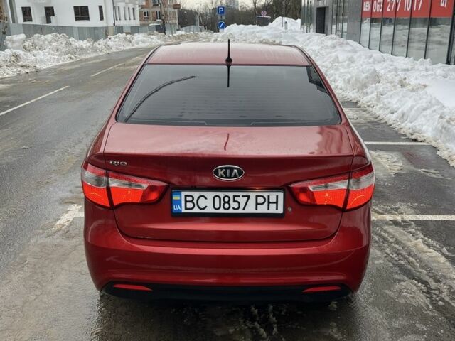 Червоний Кіа Ріо, об'ємом двигуна 1.4 л та пробігом 212 тис. км за 6000 $, фото 5 на Automoto.ua